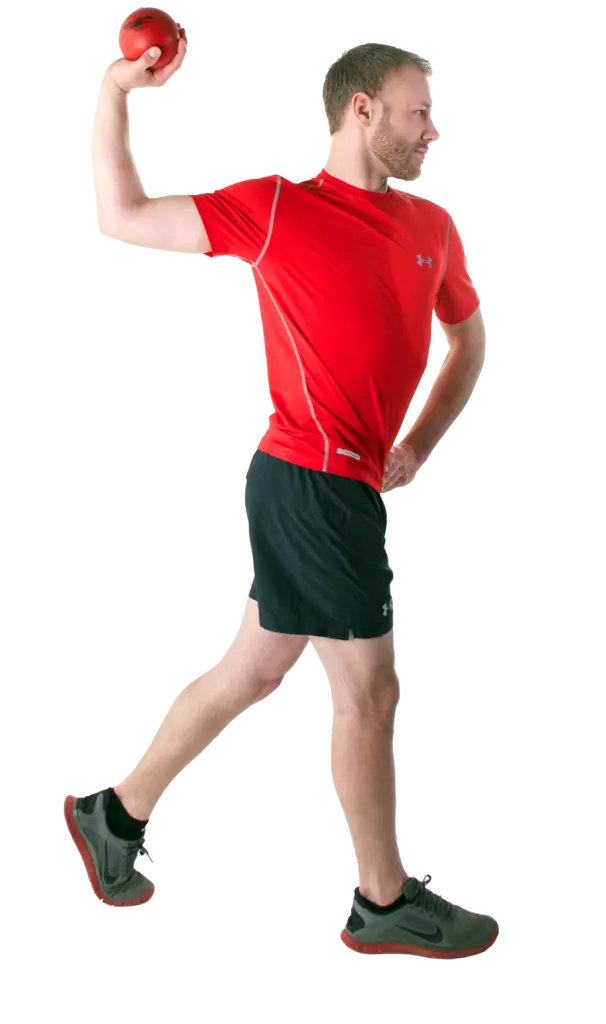 Man in red shirt throwing a ball