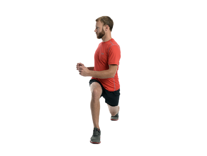 Man performing lunge exercise in red shirt.